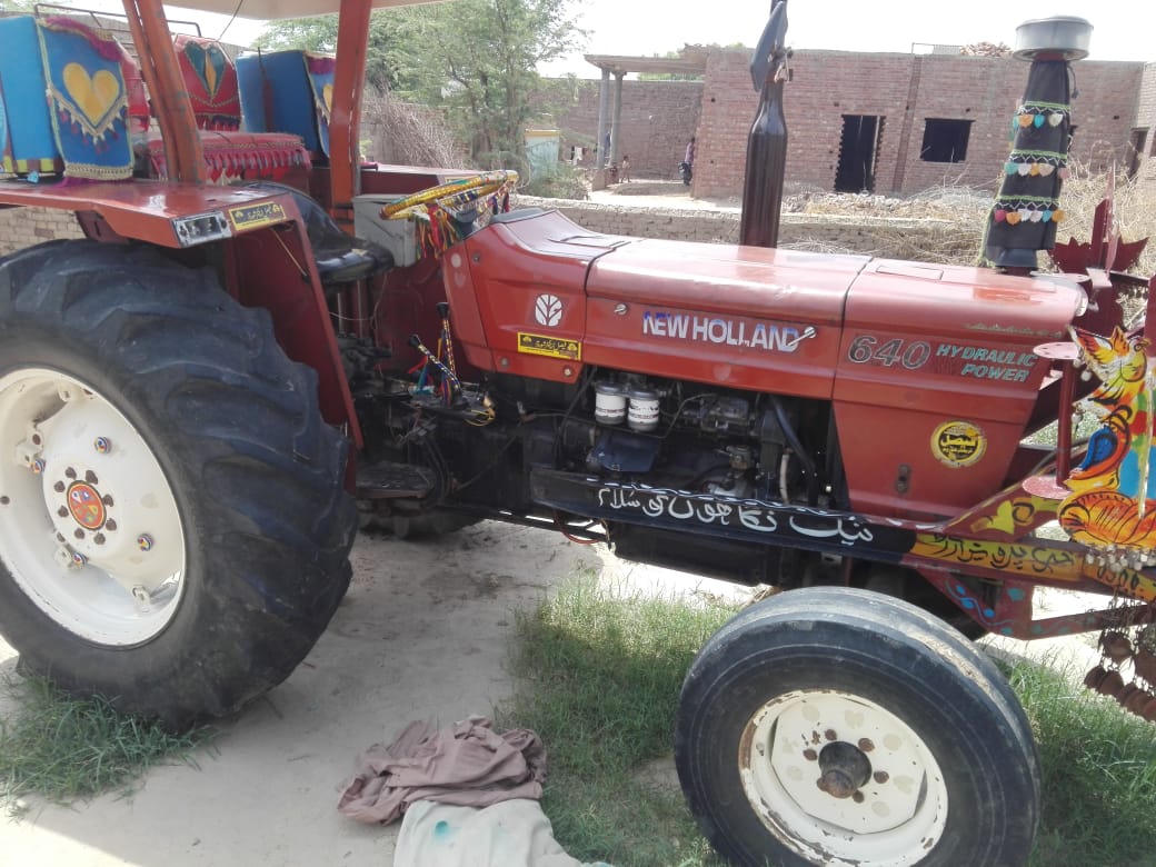 Old NH 640 75 hp tractor for sales