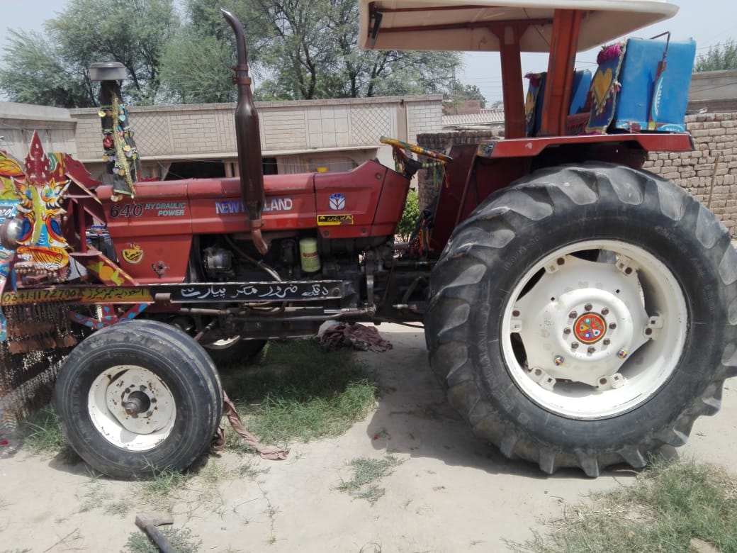 Old NH 640 75 hp tractor for sales